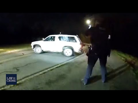Police Officer Fires Shots Into a Moving Vehicle (Full Bodycam Video)